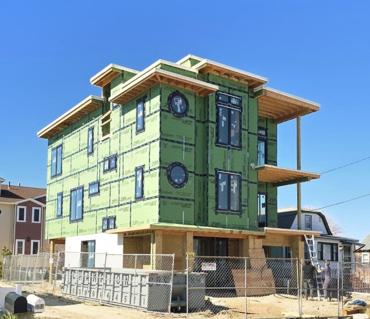 Custom home under construction at the framing stage