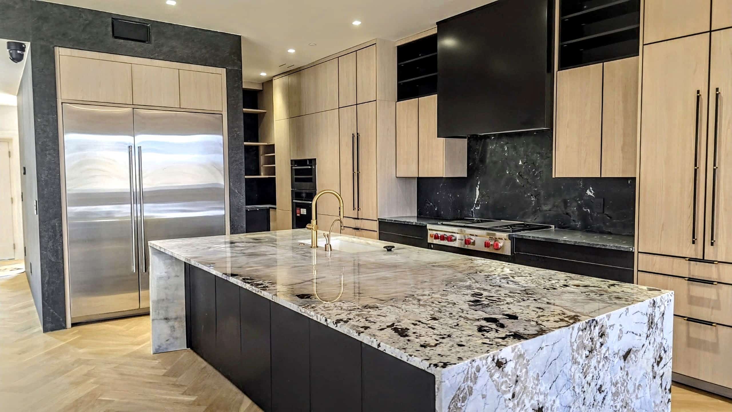 Open-concept white kitchen renovation